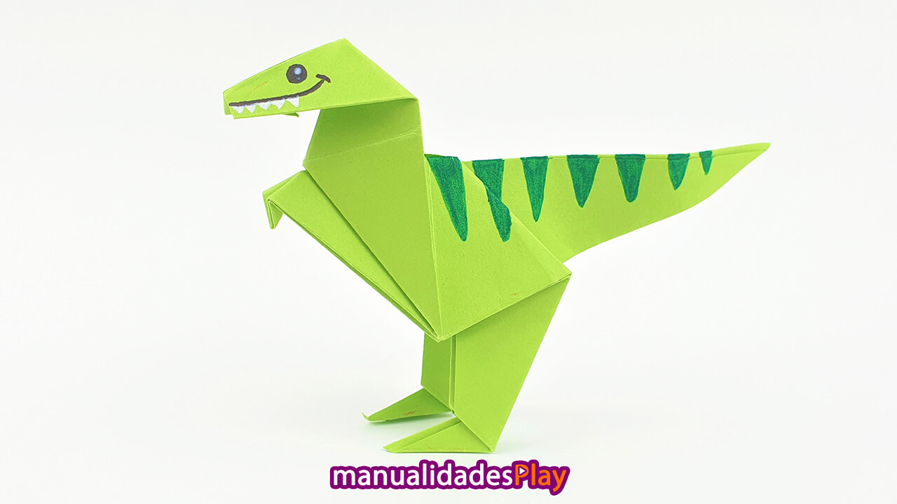 Dinosaurio de origami realizado con una hoja de papel