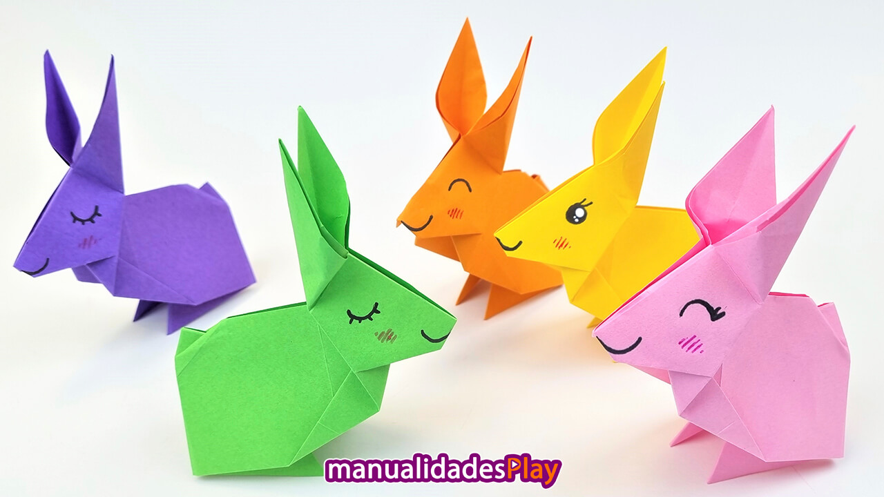 Conejito de papel realizado con origami, en total 5 conejito de diferentes colores