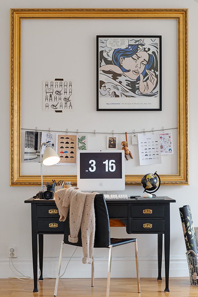 using a large gilded frame as an outer frame above a desk